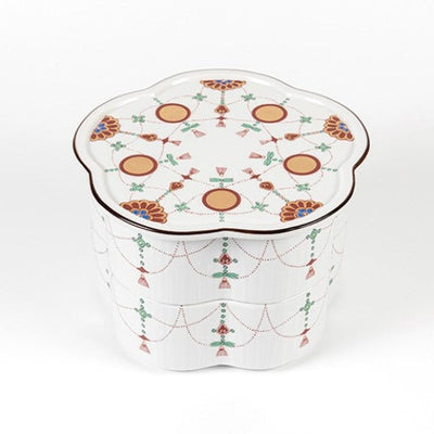 Flower-shaped two-tiered food box: Yoraku pattern with lavish red-rimmed sun disks